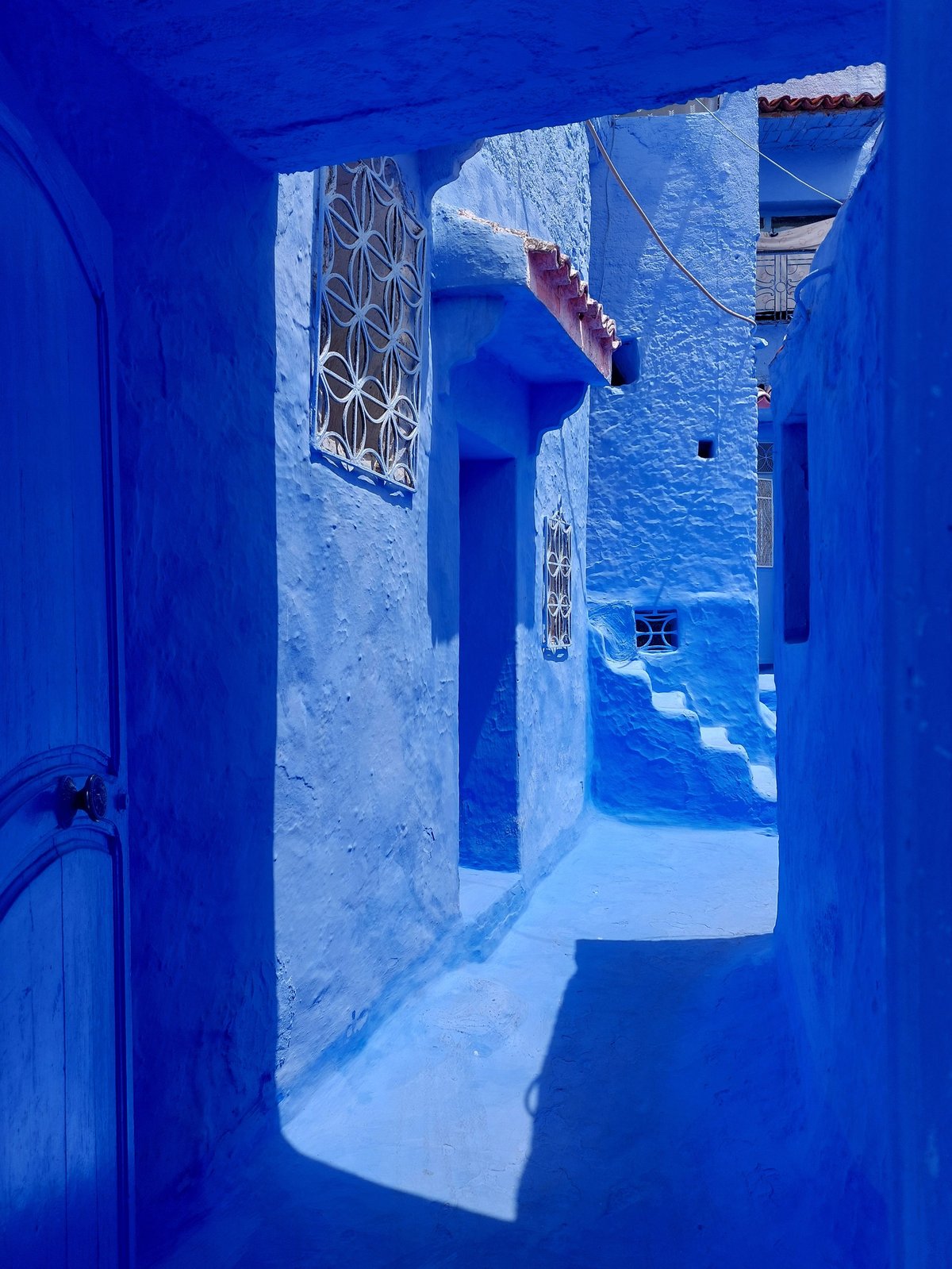 Painted blue streets, steps, doors, houses of Chefchaouen old medina, Morocco